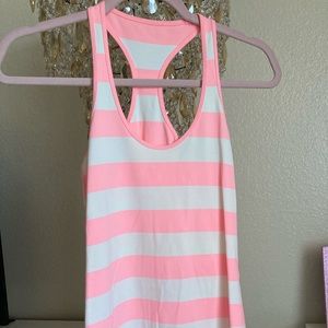 Lululemon pink and white top.
